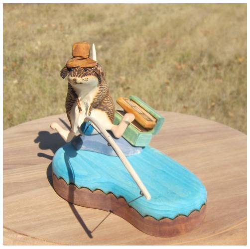 Fishing wood carving