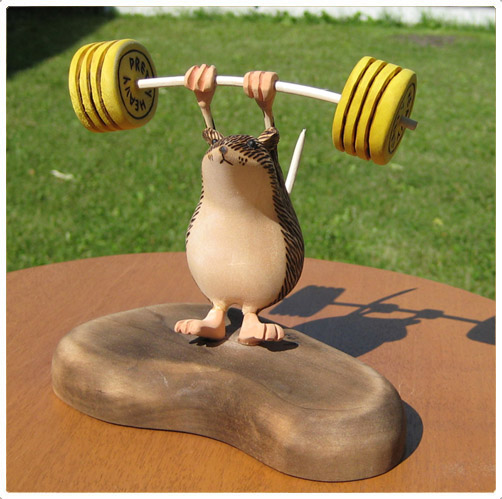 Weightlifter wood carving