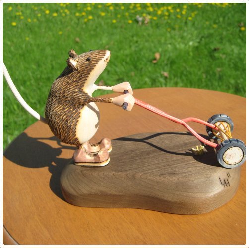 Mowing wood carving