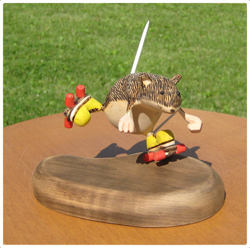 Roller skater wood carving