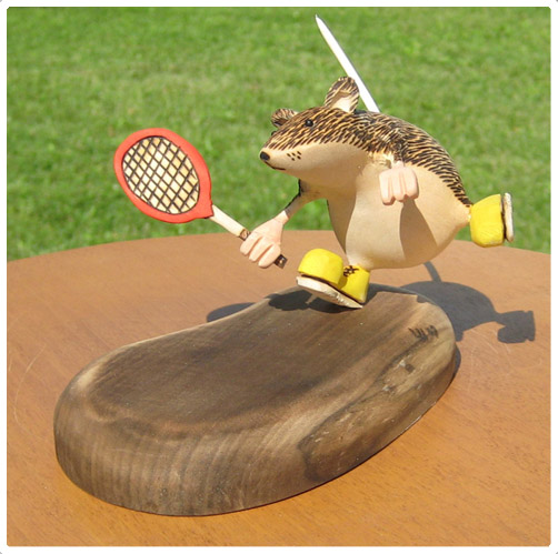 Tennis wood carving